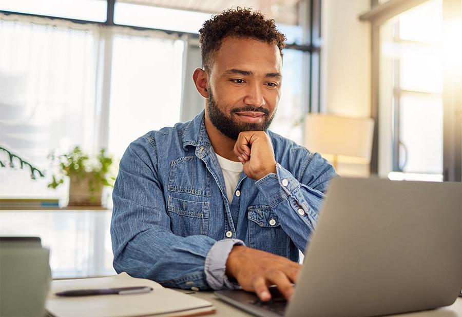 Young African American man registering online for continuing education courses